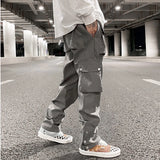 Joior High Street Multi-pocket Casual Trousers for Men and Women Side Breasted Drawstring Cargo Pants Harajuku Solid Loose Pants